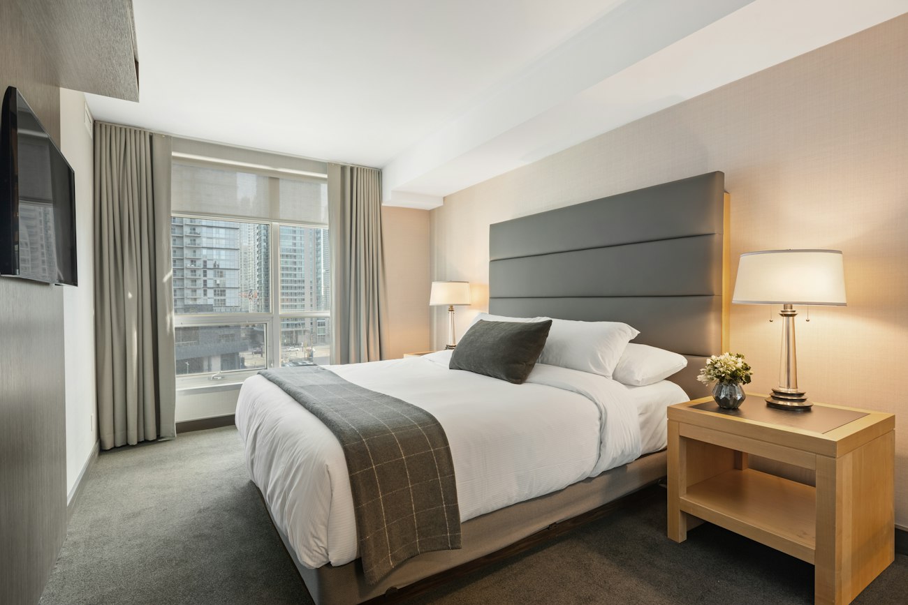 Comfortable boutique guest bedroom, illustrative stock photo